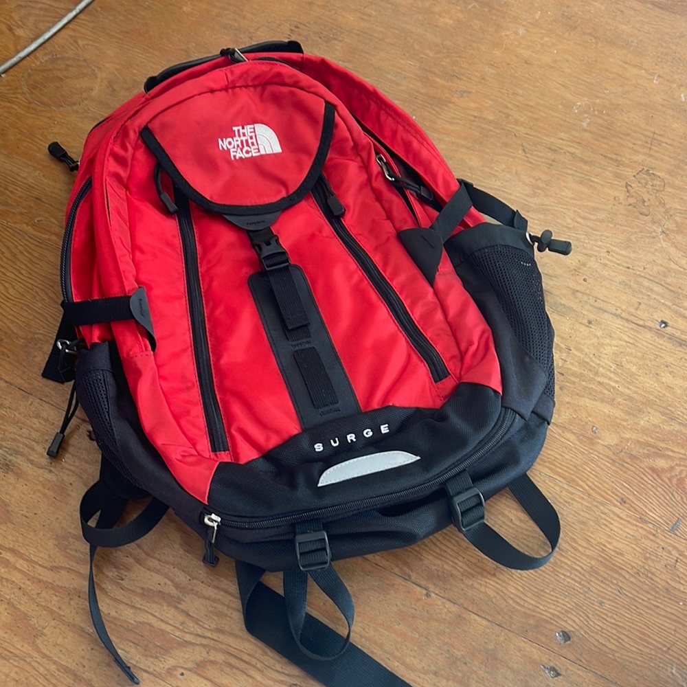 Brand new without tags Red north face surge backpack